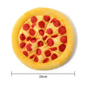 Yellow pizza slice plush dog chew toy with textured grinding surface