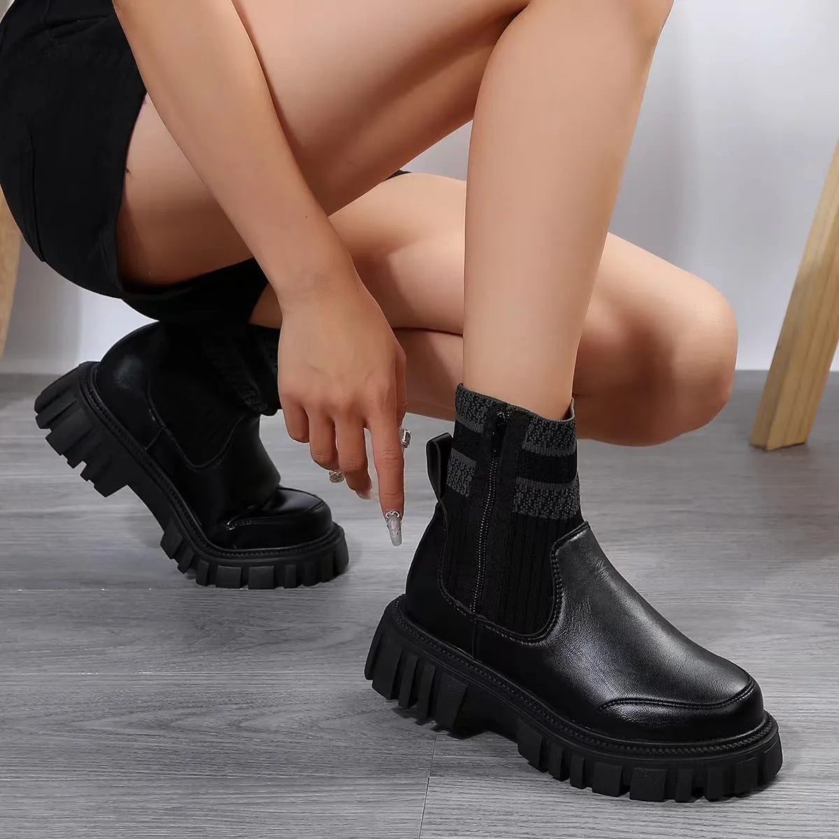 Women's mid-tube Martin boots with side zipper, elastic knitted patchwork, and non-slip rubber sole in beige, black, or brown.