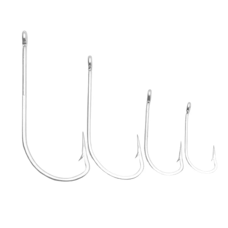 Assortment of alloy sea fishing hooks on a blue background for ocean boat fishing.
