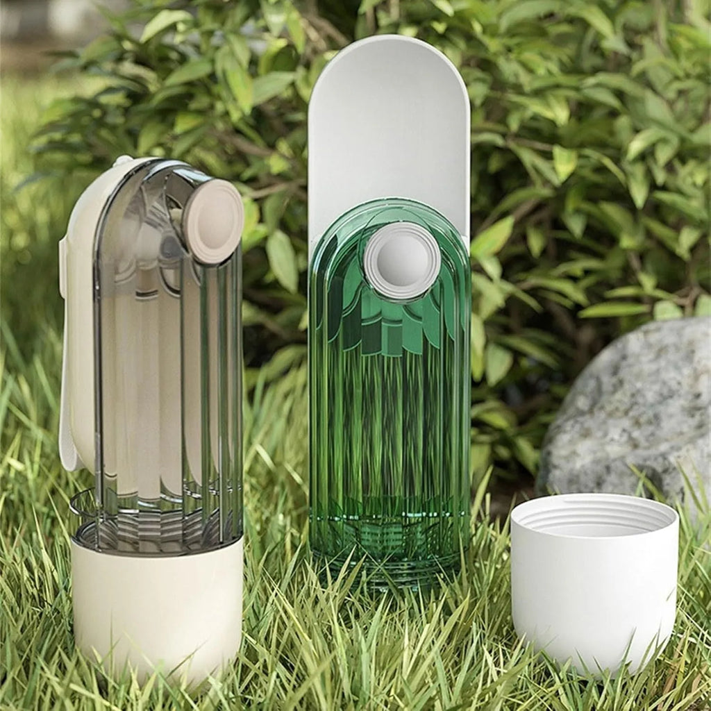 Foldable dog water bottle with food dispenser in beige or green colours for outdoor walking and hiking
