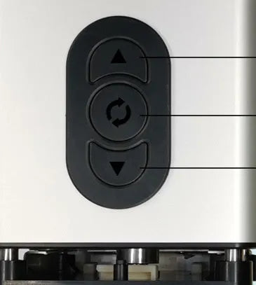 Black electric French fry cutter with stainless steel blades on a kitchen countertop.