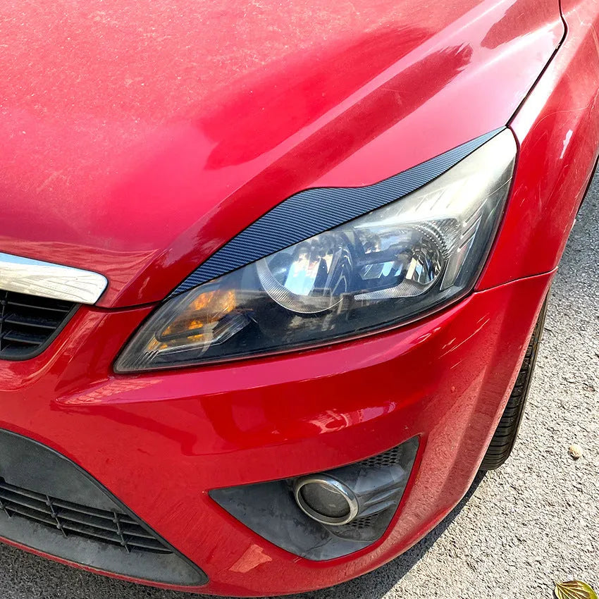 Ford Focus headlight eyebrow sticker set in carbon fibre pattern and piano black finish