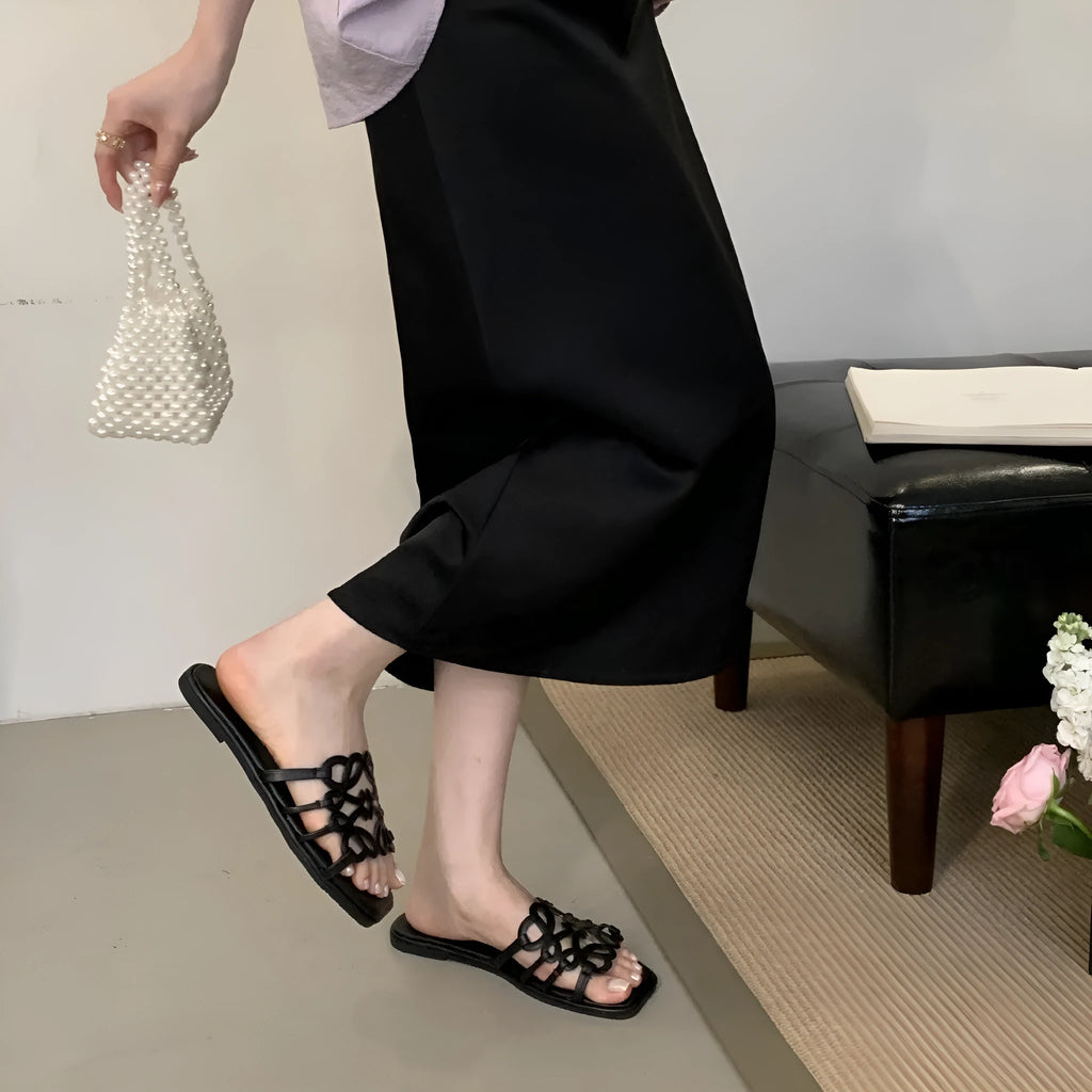 Women's flat Roman style hollow-out beach slippers in solid colour, PU leather upper, sizes 35-39