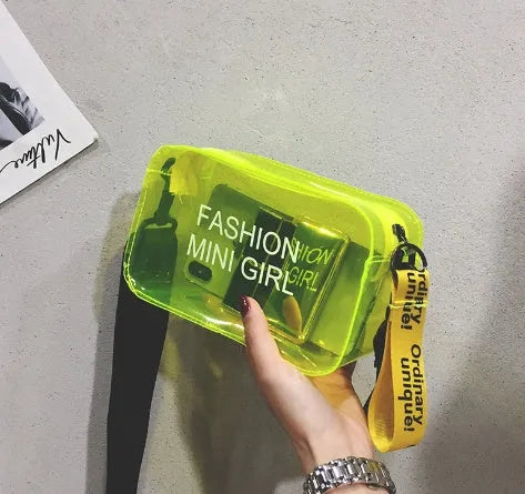 A transparent square jelly cross-body bag in a choice of colours, shown with an adjustable strap and a mobile phone inside.