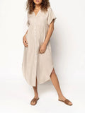 Loose-fitting casual midi dress with buttons down the front, shown in a solid colour.