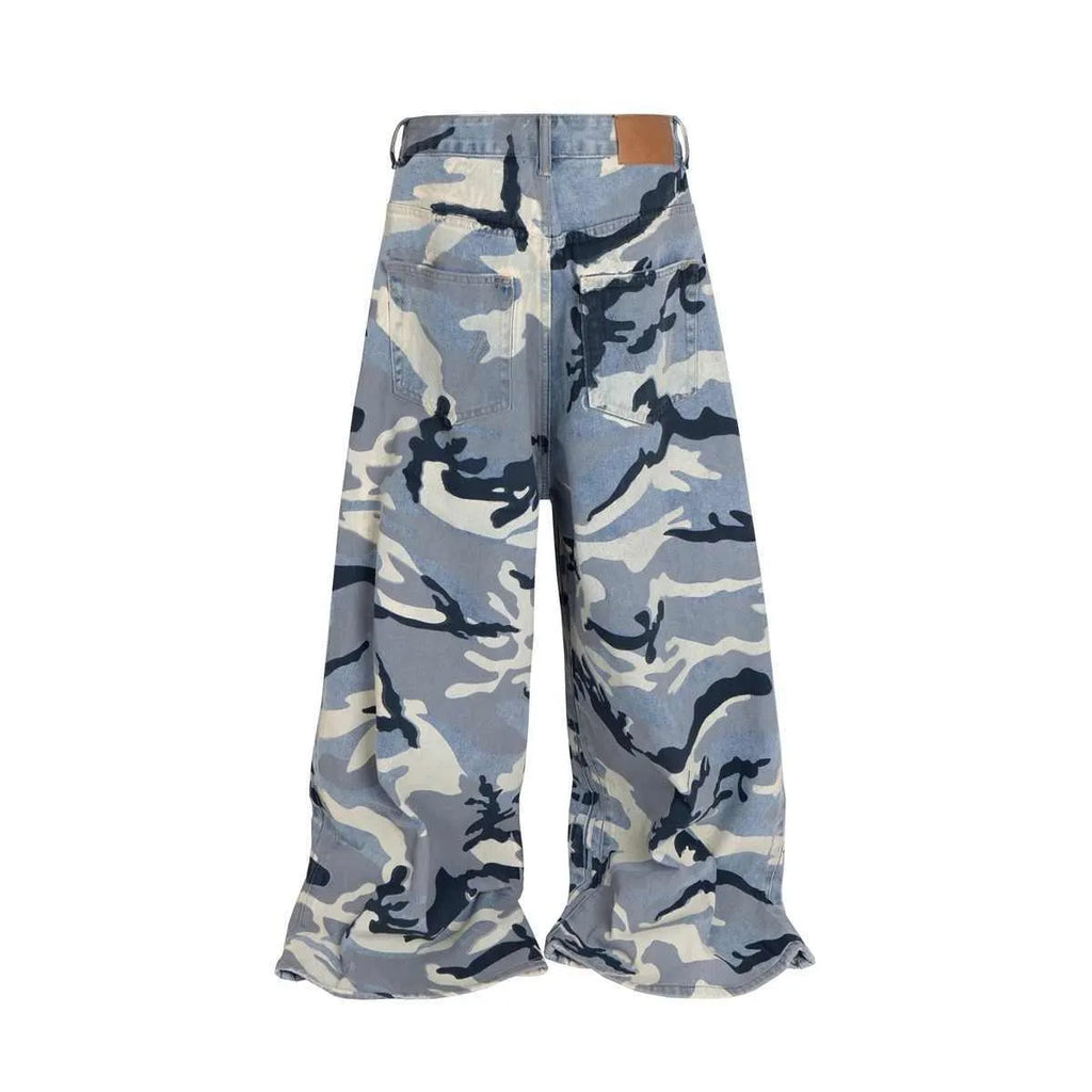 Snow camouflage blue loose-fit jeans with a mid waist on a neutral background.