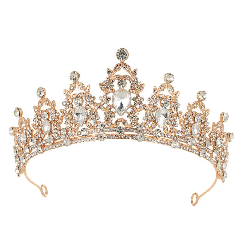 Baroque-style bridal crown hair accessory with rhinestones on an alloy frame in silver and gold colour options.
