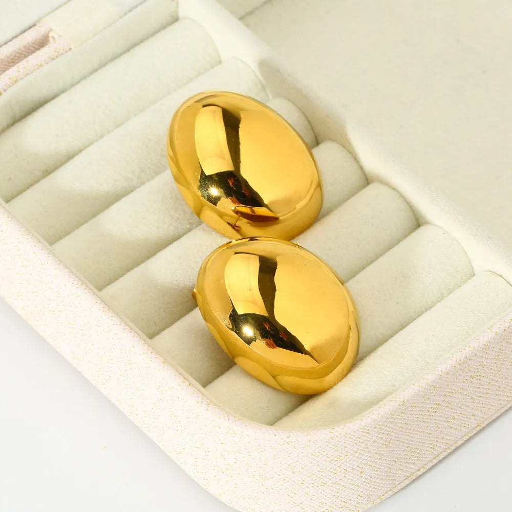 Geometric line earrings in stainless steel with 18K gold electroplated finish and glazed surface