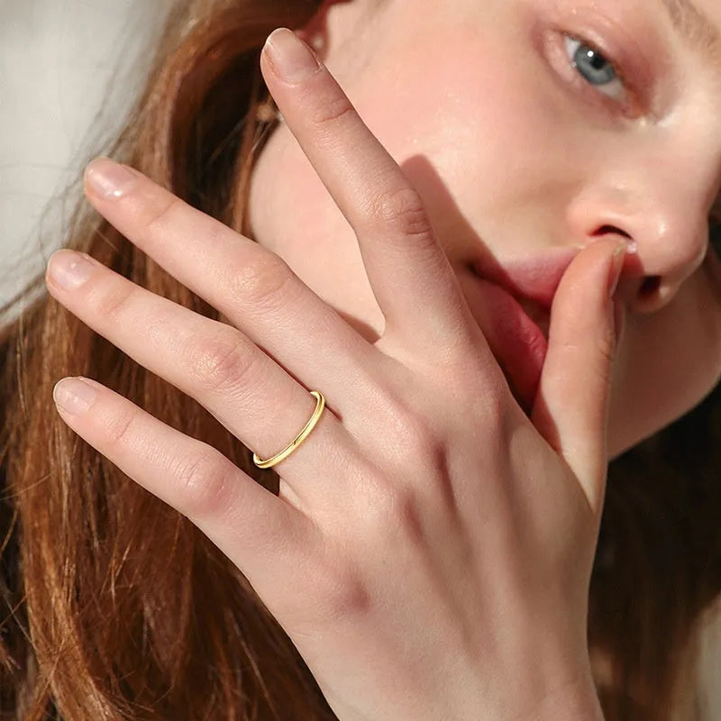Simple geometric round bracelet ring in sterling silver, gold, and platinum colour options.