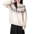 Milky white women's vintage Fair Isle geometric pattern pullover sweater with long sleeves.