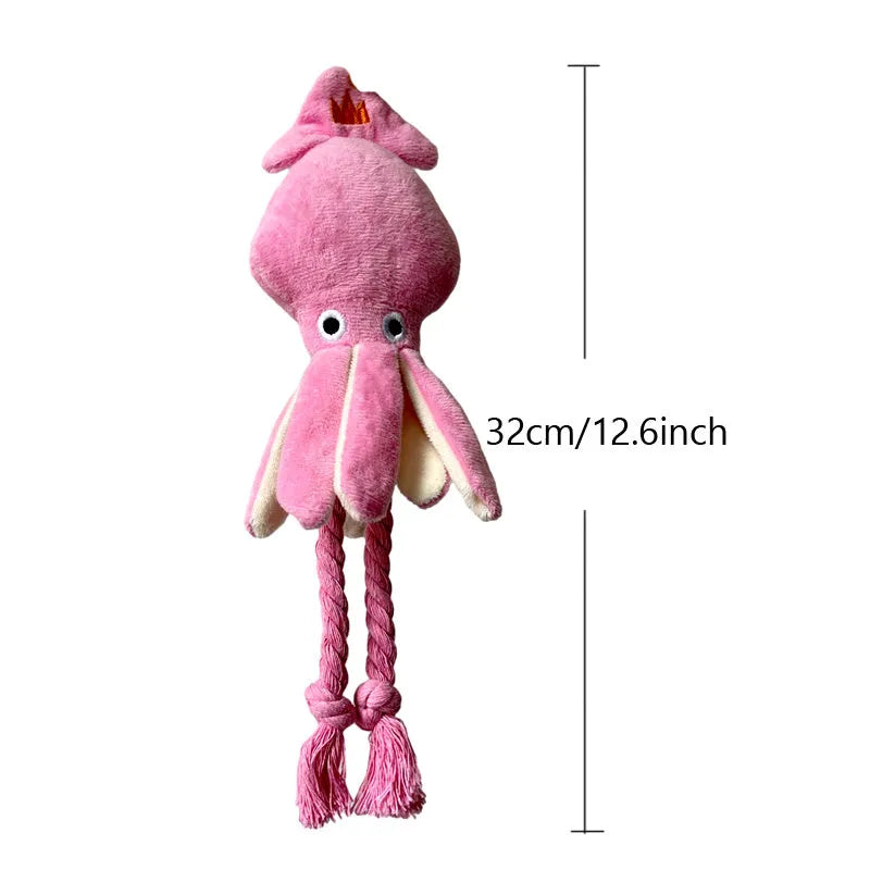 Pink squid-shaped plush dog toy with rope texture and a built-in squeaker.
