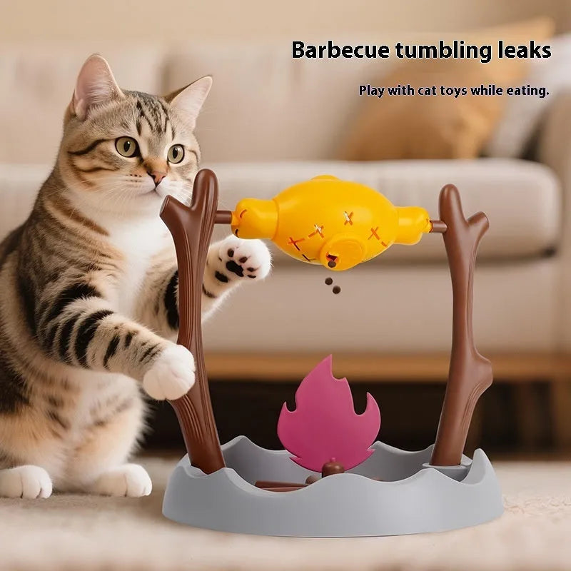 Tumbling barbecue design cat feeder toy with food compartments measuring 30x30x29cm
