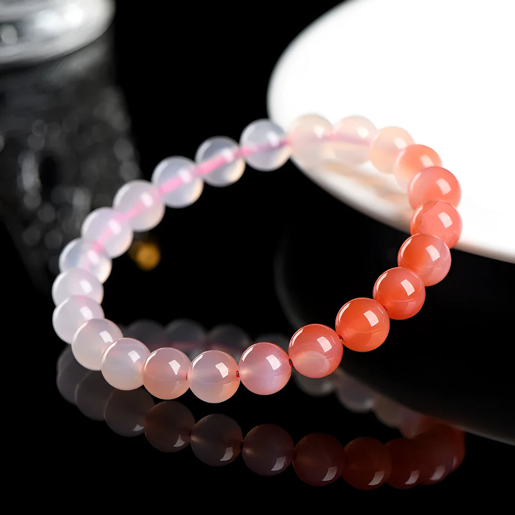Natural gradient Yanyuan agate bracelet showing geometric beads in a salt source colour tone.