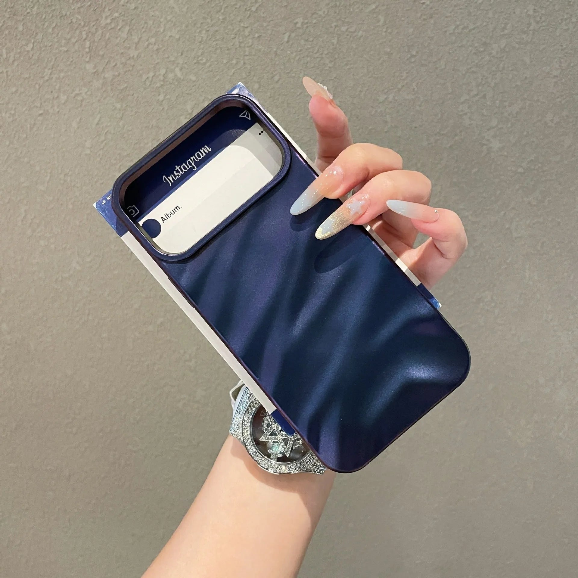 Soft wave pleated TPU phone case for Apple iPhone 17 in a selection of colours including electroplated gold and matte purple.