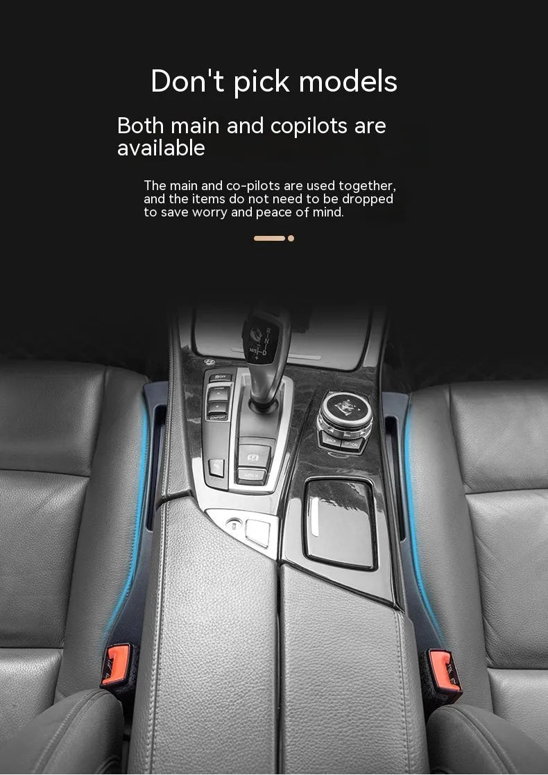 Black plastic car seat gap storage box organising items between vehicle seats