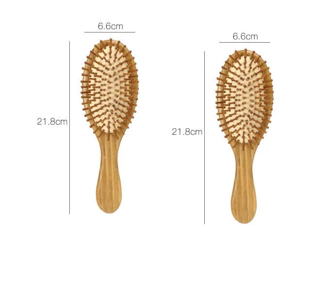 Carbonized bamboo massage comb 66x218mm on a neutral background, showing natural wood texture and teeth