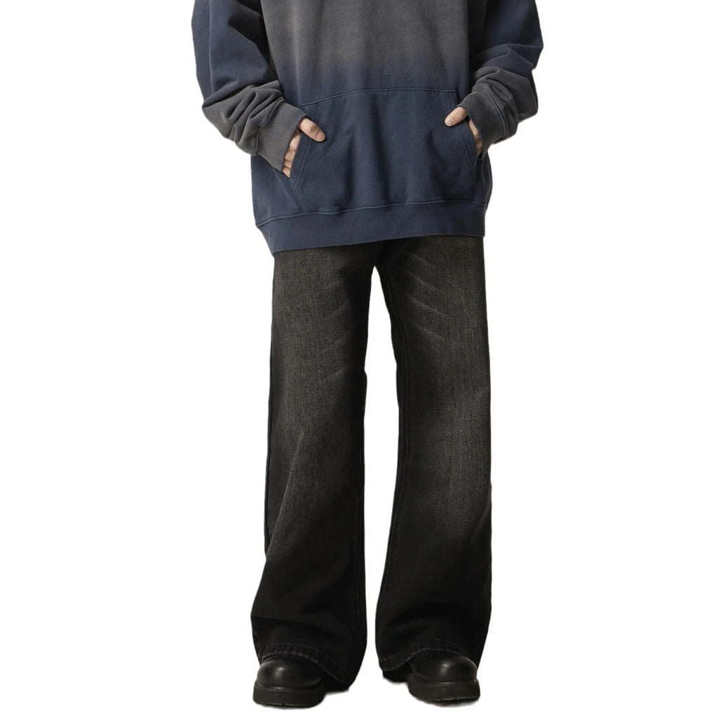Black loose straight leg jeans with retro styling and zipper fly closure