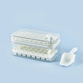 Green one-button press ice cube tray mould with transparent lid and storage box