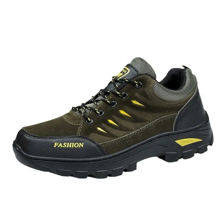 Men's suede hiking shoes with rubber sole in green colour showing mid-top design and lace-up closure