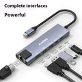 Aluminium Steam Deck docking station with six ports including HDMI, Ethernet, and USB 3.0, shown with a 15cm cable.