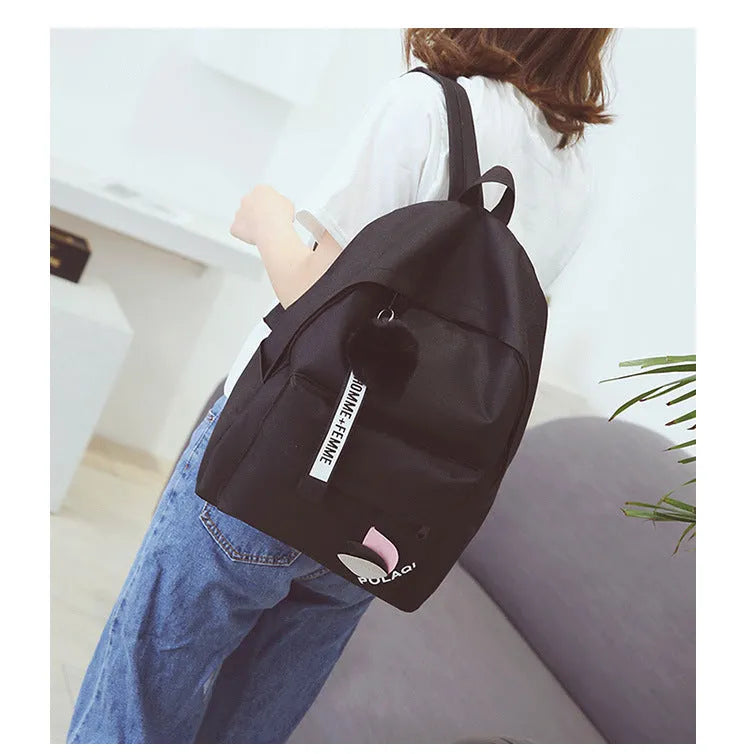 Green canvas college schoolbag with casual styling and anti-theft features