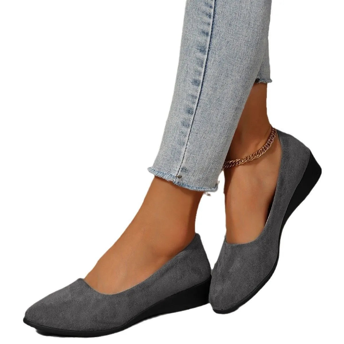 Women's light brown suede wedge pumps with a round toe and shallow mouth design on a rubber sole.