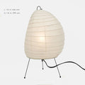 Japanese style rice paper table lamp with handmade shade on aluminium base showing three-tone dimming button