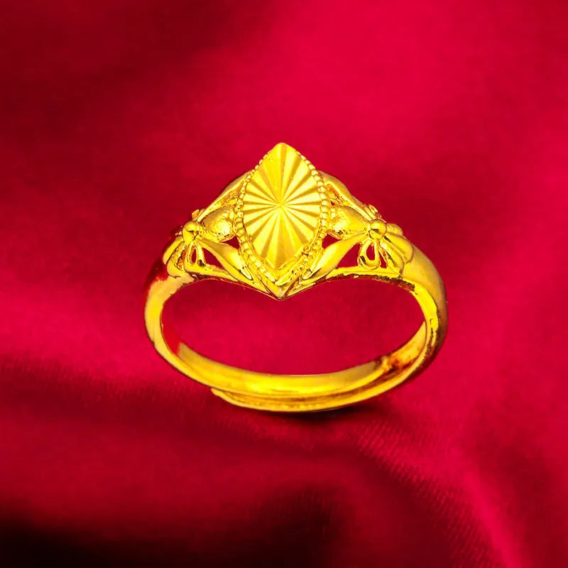 Gold electroplated brass ring with geometric open diamond flower design