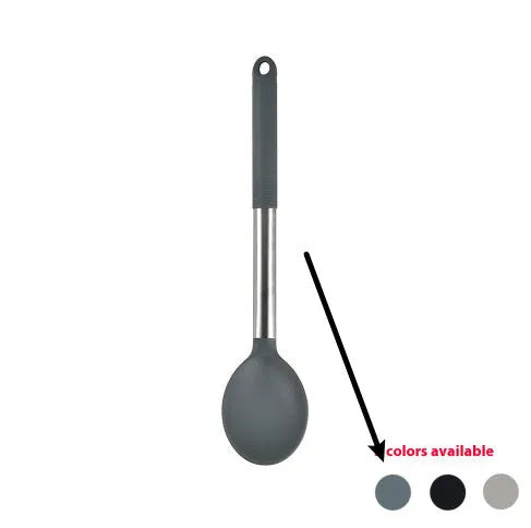 Silicone kitchen utensil set with twelve tools in a rotating white storage caddy on a counter.