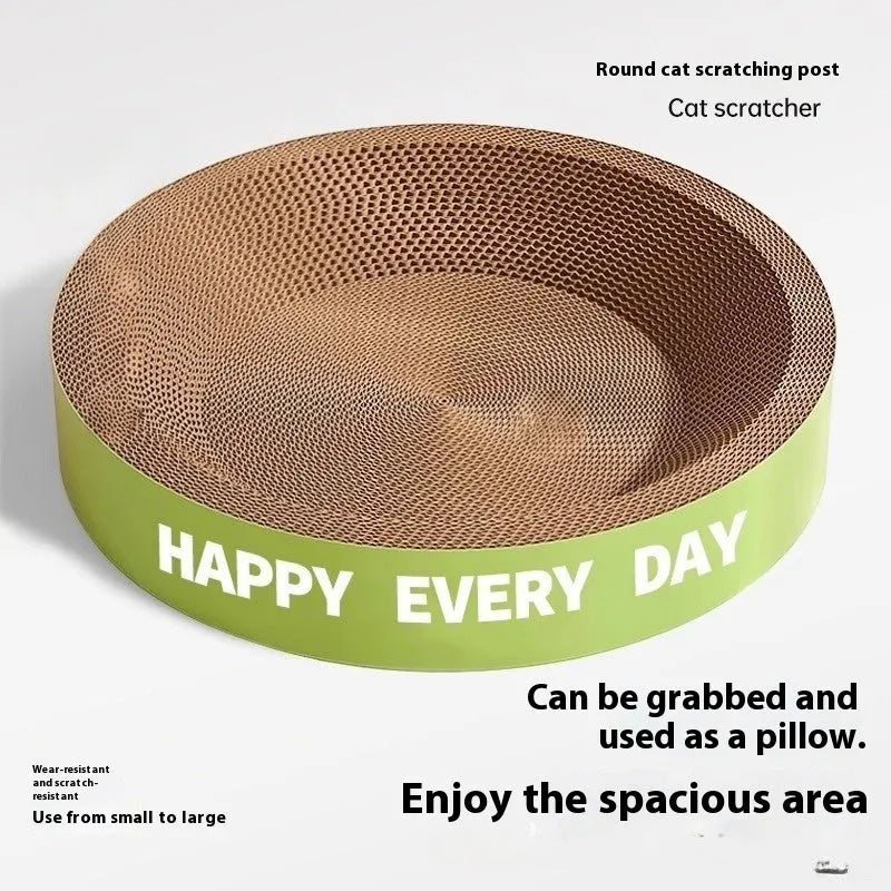 Green round cat nest with a textured sisal scratching board surface, shown in a home setting.