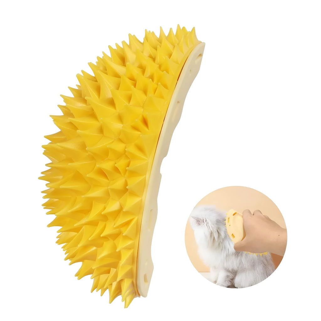 Yellow durian-shaped cat corner scratcher with grooming comb attached to a wall.