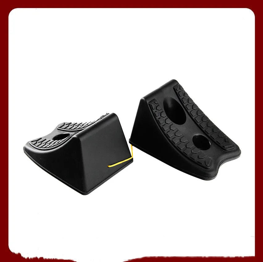 Black rubber automobile universal wheel stopper with triangular anti-slip base on sloped ground