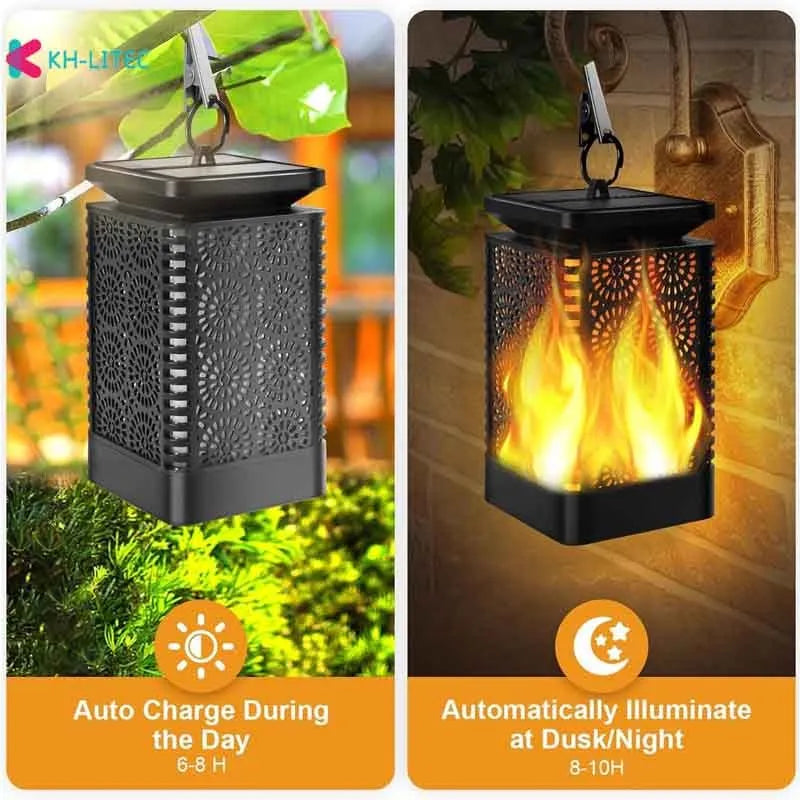 Four black solar-powered outdoor torch lights with flickering LED flame effect, placed on a garden patio.