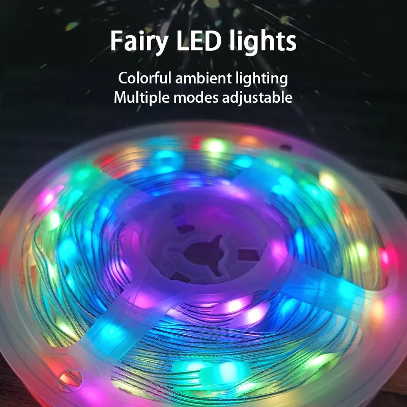 Long 10-metre multi-colour LED party light string with 100 lights coiled on a reel.