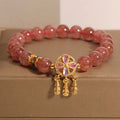 Women's crystal bracelet with strawberry quartz four-leaf dream catcher ball pendant