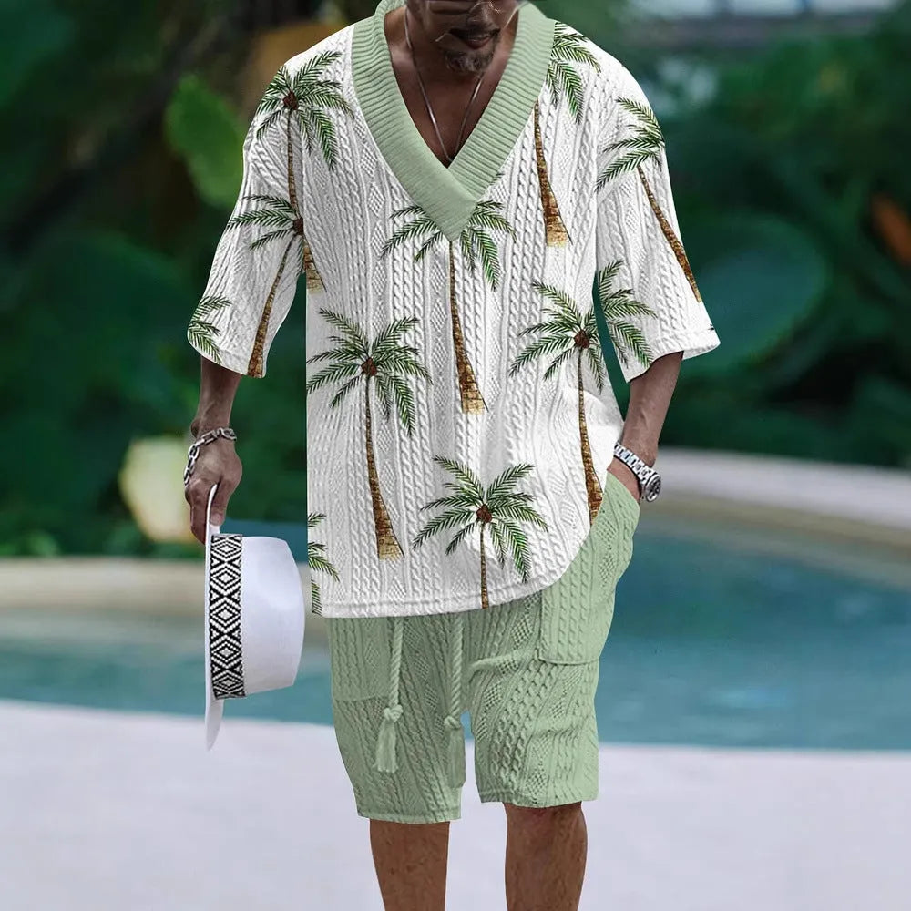 A man's loose-fitting casual short sleeve suit in a solid colour, featuring a short-sleeve top and matching shorts.