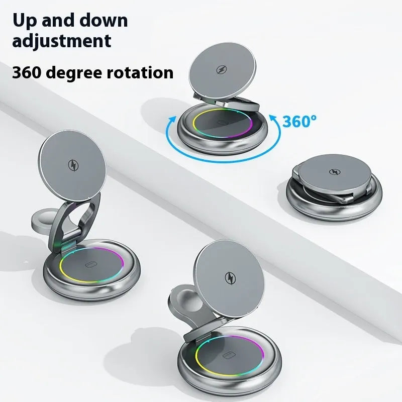 Silver Gray metal 3-in-1 wireless rotatable charger bracket with foldable design on a white desk charging phone, watch, and earbuds