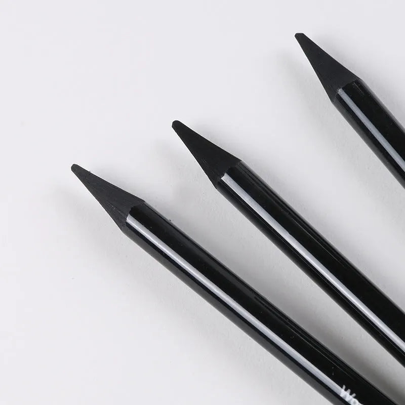 A pack of wooden graphite and carbonised drawing pencils on a suction card.