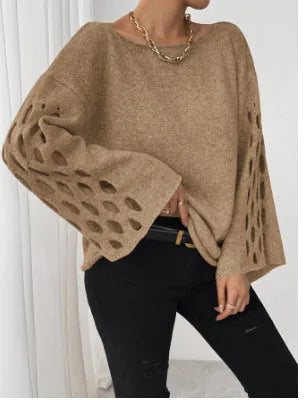 Women's solid color round neck long sleeve hollow sweater pullover in gray, front view