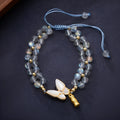 Gray moonstone woven bracelet for women with butterfly hand rope design and geometric retro style