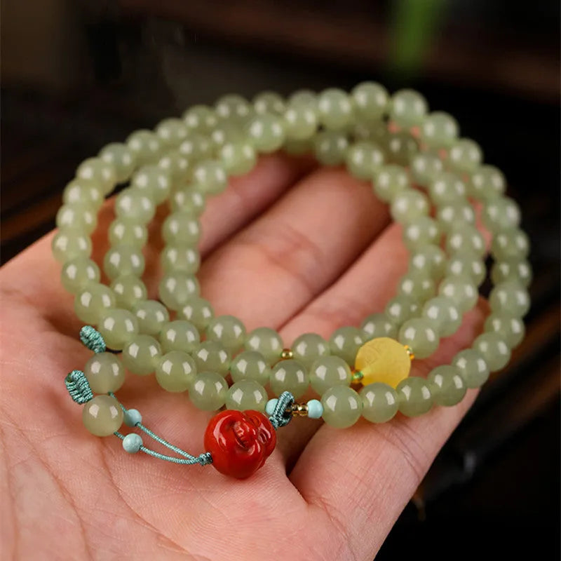 Pale blue Hetian jade bracelet with 6mm beads in three-circle design for women