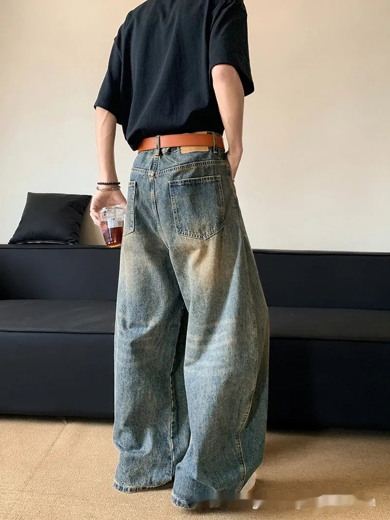 Men's retro blue distressed wide-leg jeans with slimming fit and zipper fly