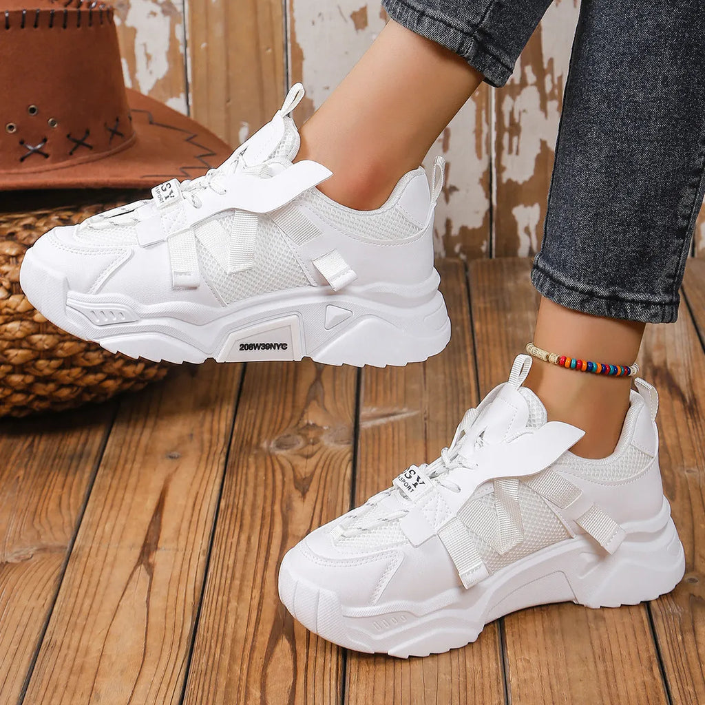 Women's platform mesh dad sneaker in multiple colours with lace-up front and thick sole.