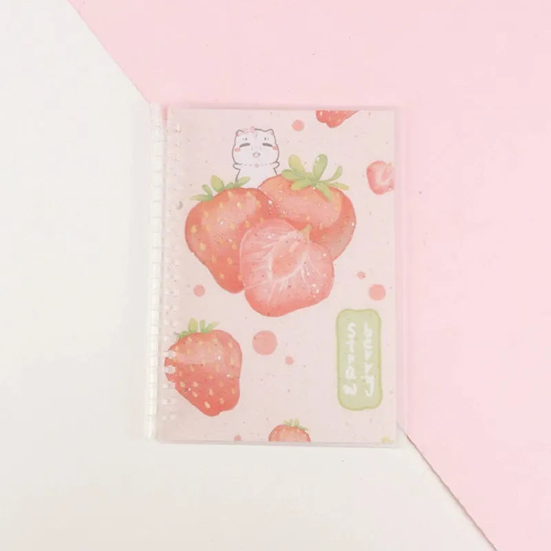 Children's hand-ledger notebook with hardcover showing animal designs including whale and fruit patterns