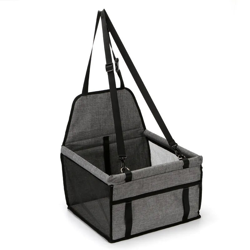 Foldable pet safety seat car bag in black Oxford cloth on a car seat with safety tether visible