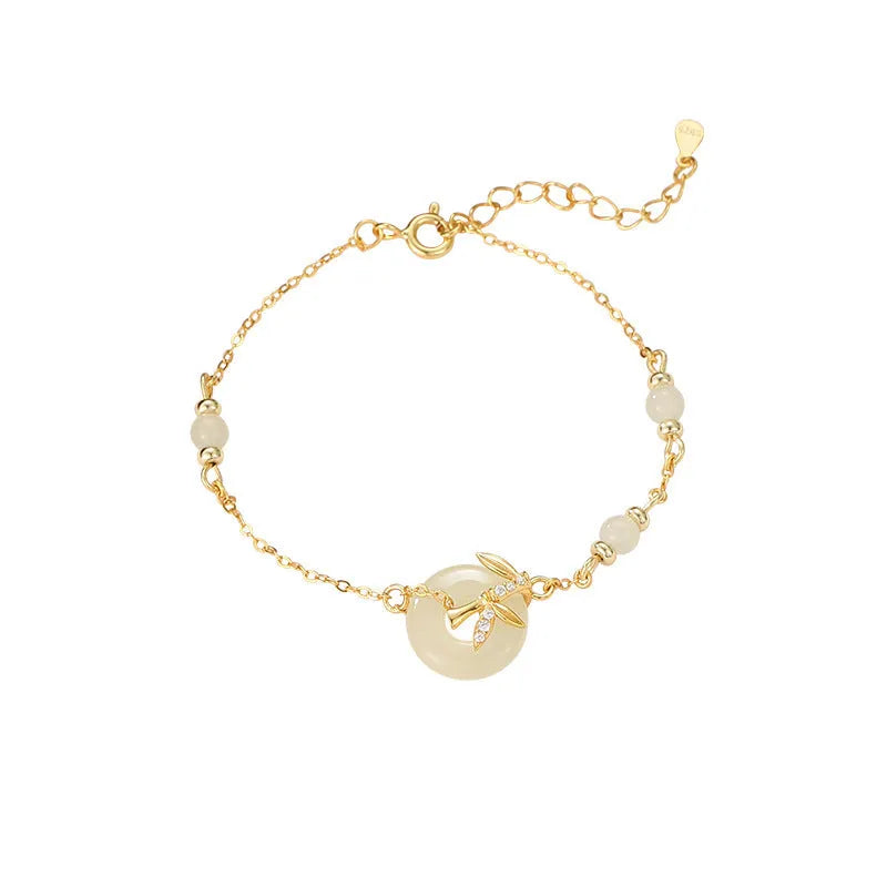 Antique style women's 925 silver bracelet with a peace buckle and safety clasp on a jewellery tray.