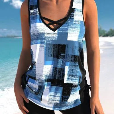 Women's printed split boxer swimsuit set with matching top and shorts on a mannequin.