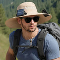 Solar-powered fan hat with integrated cooling fan and solar panel on brim