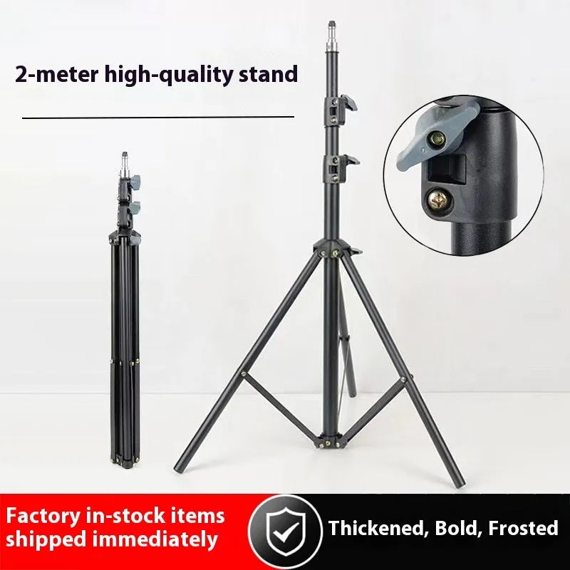 Carbon steel tripod stand with frosted legs and mobile phone holder attached