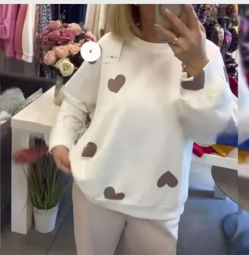 Women's long sleeve knitted sweater with 3D stereo pattern in pink, loose fit pullover style